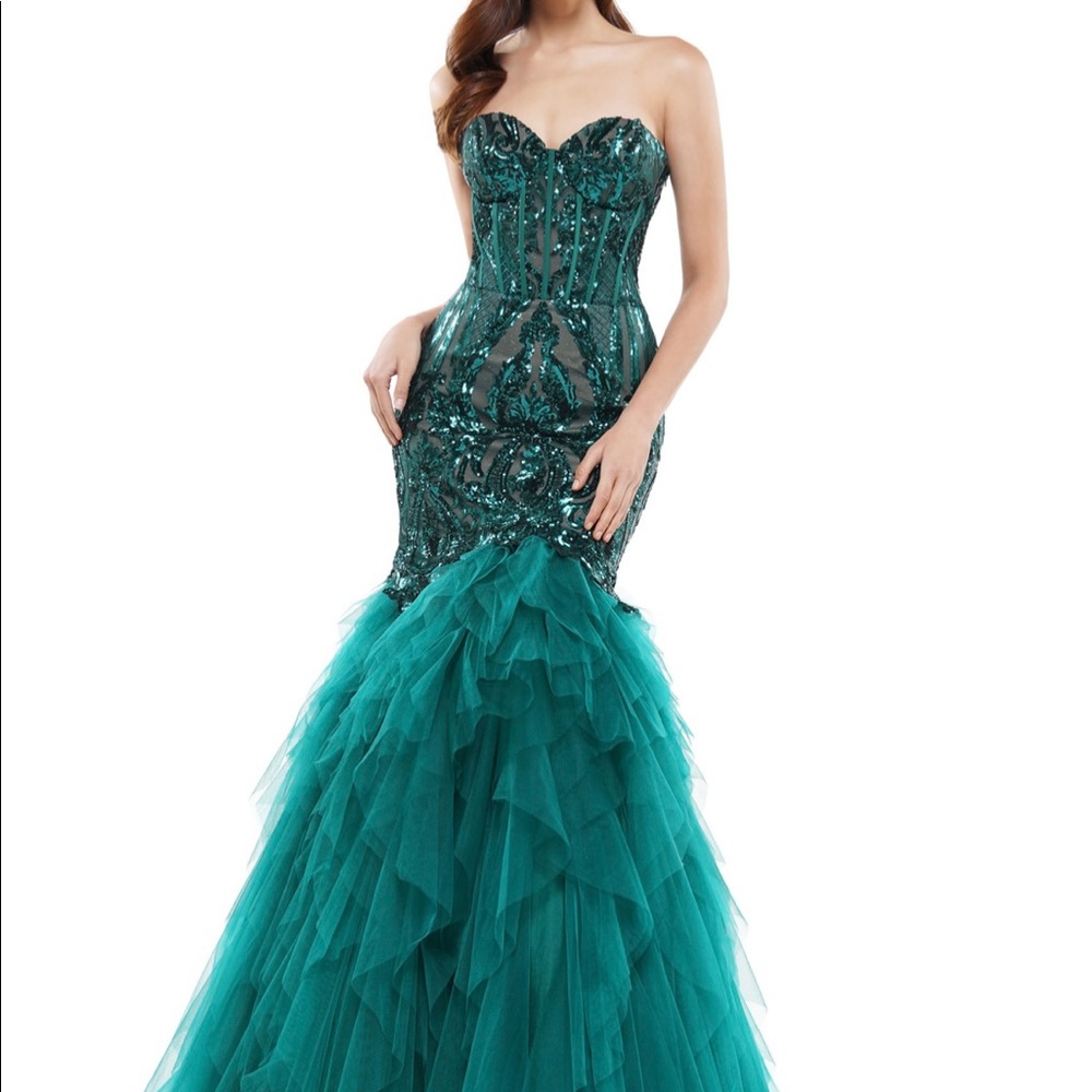 Emerald green mermaid prom gown with ruffles